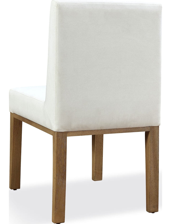 One Coastal Upholstered Dining Side Chair in White Pearl and Bisque — product view on a white background