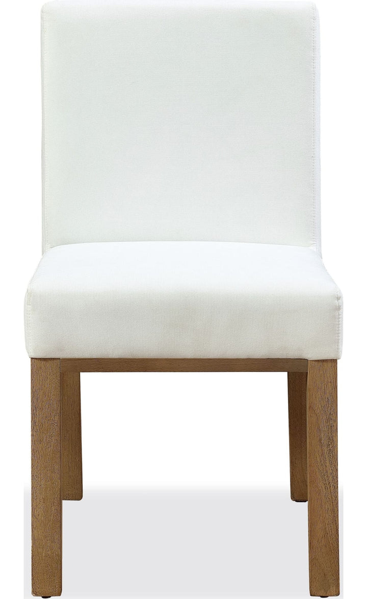 One Coastal Upholstered Dining Side Chair in White Pearl and Bisque — product view on a white background
