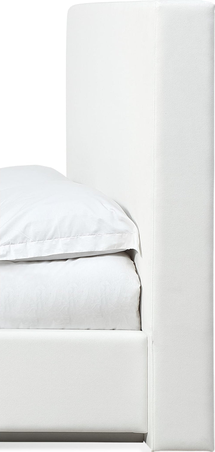 One Upholstered Footboard Storage Bed in Pearl — close-up of the headboard side profile