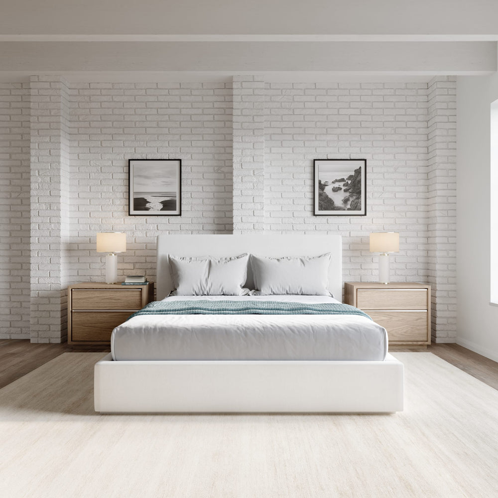 One Upholstered Footboard Storage Bed in Pearl styled in a bedroom