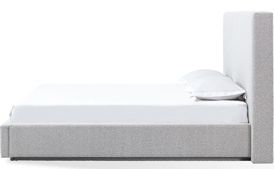 One Upholstered Platform Bed in Cotton Ball Boucle — white background, side profile