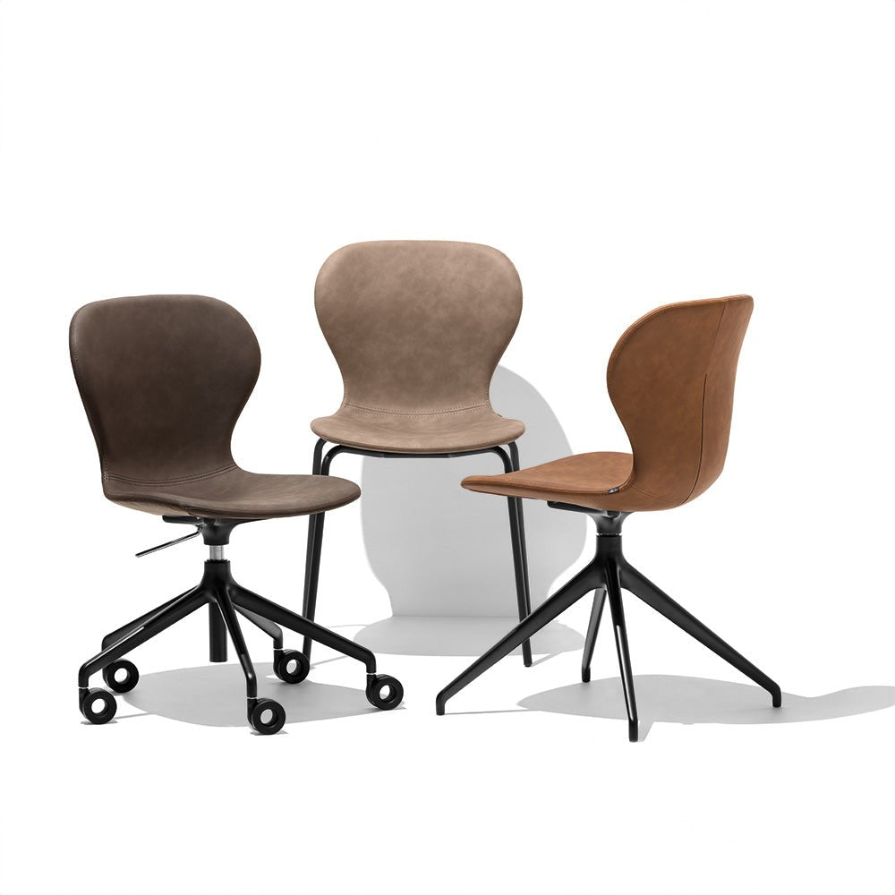 Ops! Swivel Dining Chair by Connubia in a styled interior