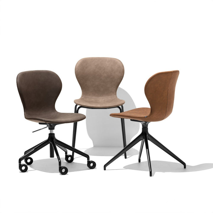 Ops! Swivel Dining Chair by Connubia in a styled interior