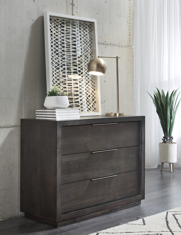 Oxford Three Drawer Nightstand in Basalt Grey — styled in a room
