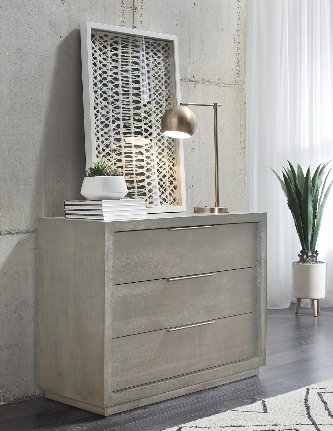 Oxford Three Drawer Nightstand in Mineral — styled in a room