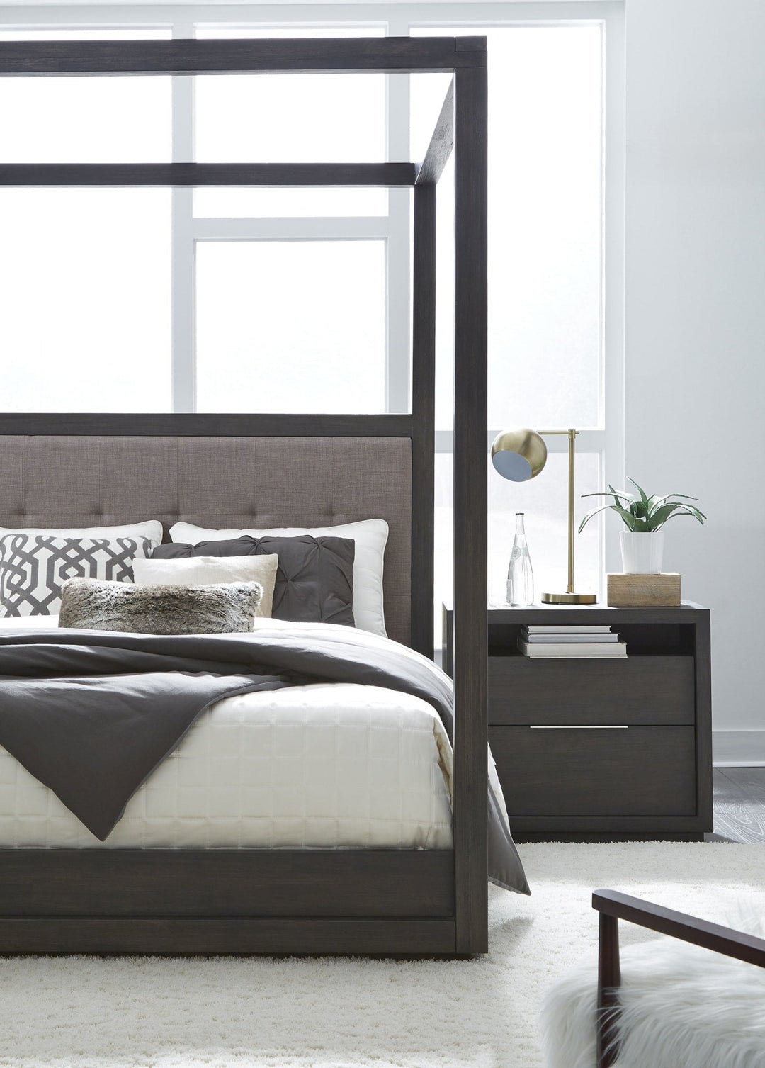 Oxford Upholstered Canopy Bed in Basalt Grey styled in a bedroom