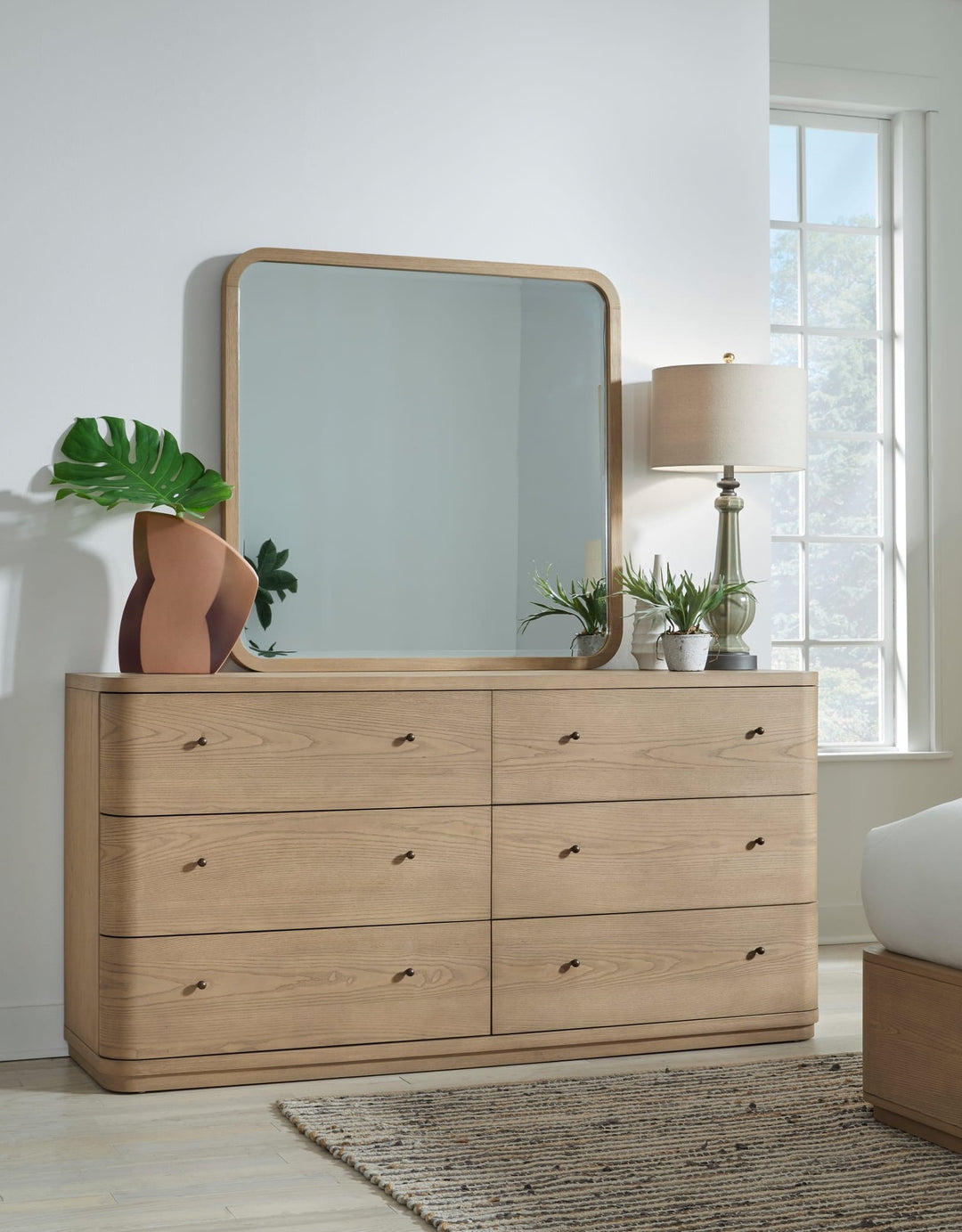 Penny Six Drawer Dresser in Buff Cream — styled with the matching mirror (sold separately)