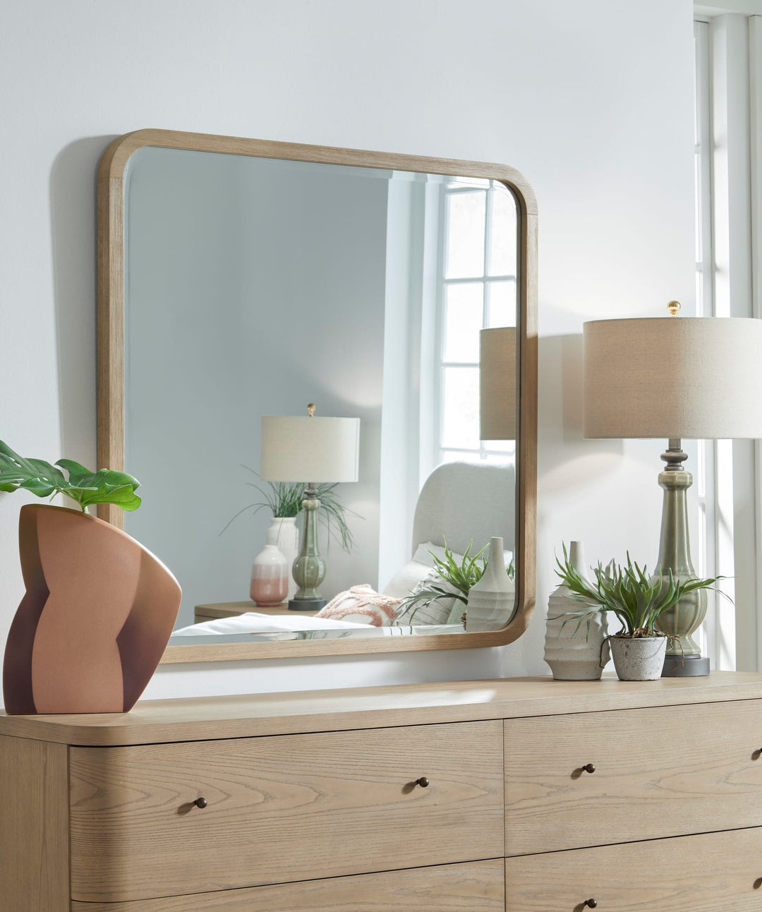 Penny Wall or Dresser Mirror in Buff Cream — styled on the matching dresser (sold separately)