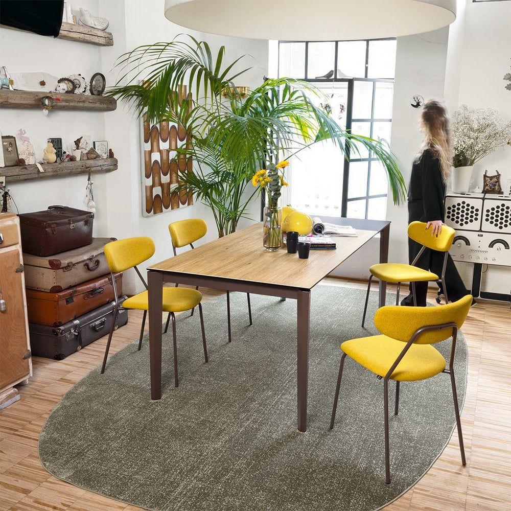 Pentagon Extendable Dining Table by Connubia in a styled interior