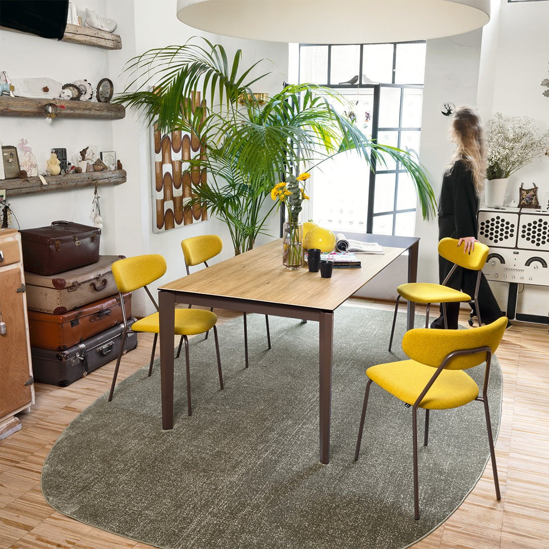 Pentagon Extendable Dining Table by Connubia in a styled interior
