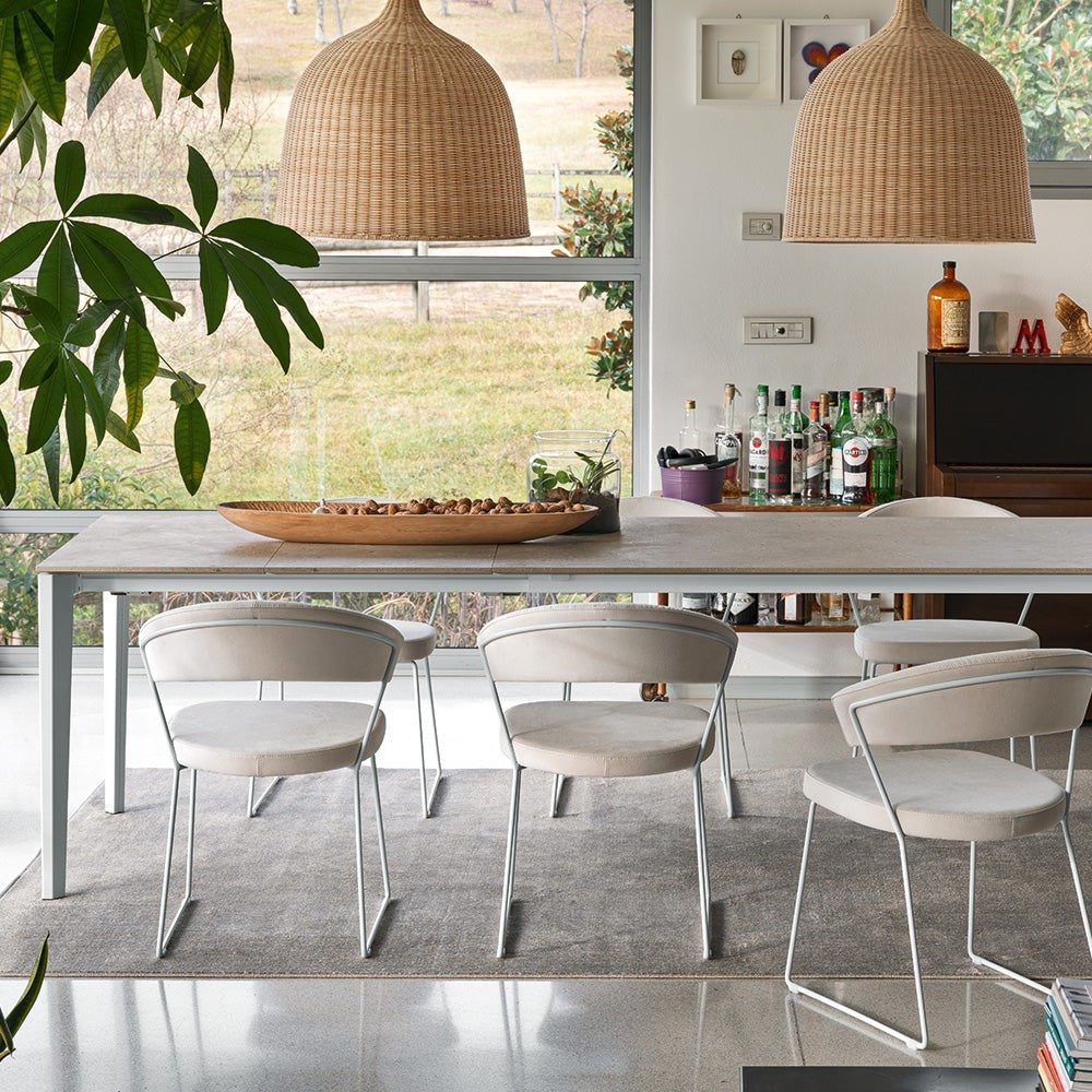Pentagon Extendable Dining Table by Connubia in a styled interior