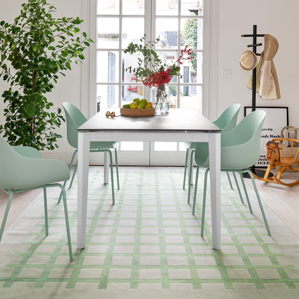 Pentagon Fast Extendable Dining Table by Connubia in a styled interior