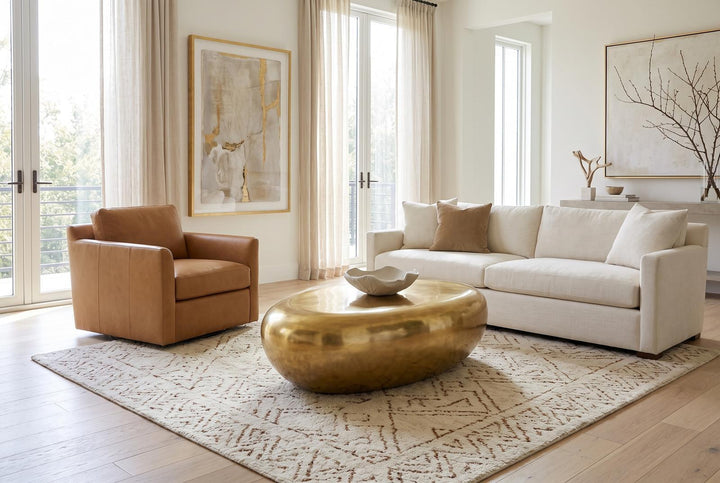 River Stone Coffee Table, Liquid Gold, Large by Phillips Collection — room setting