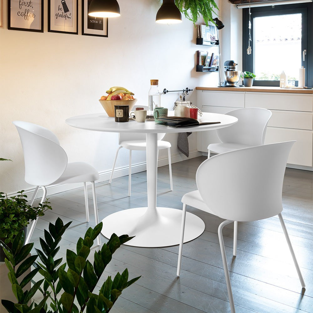 Planet Compact Round Dining Table by Connubia in a styled interior