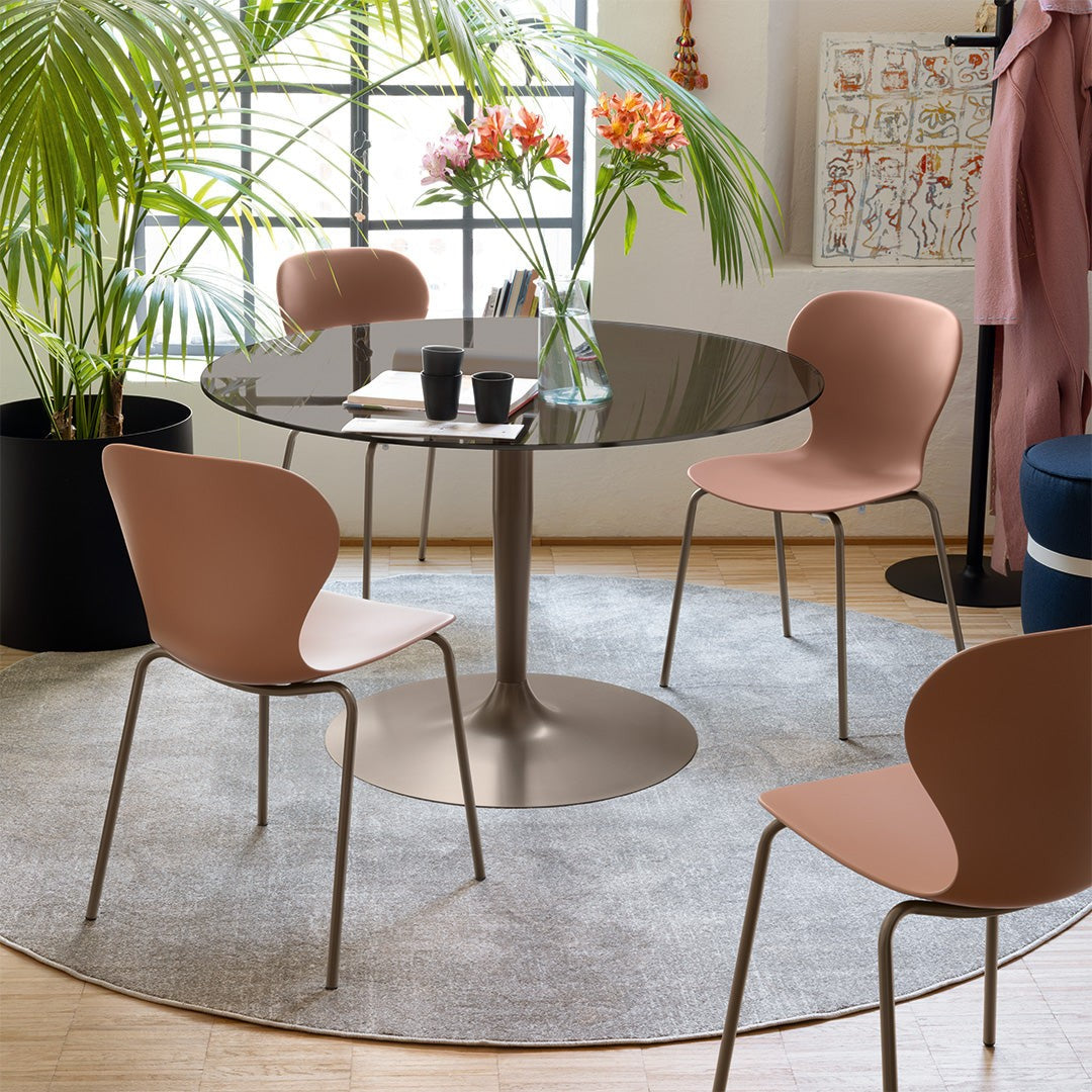 Planet Compact Round Dining Table by Connubia in a styled interior