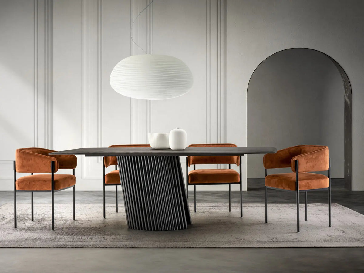 Warm contemporary dining room with modern table and chairs