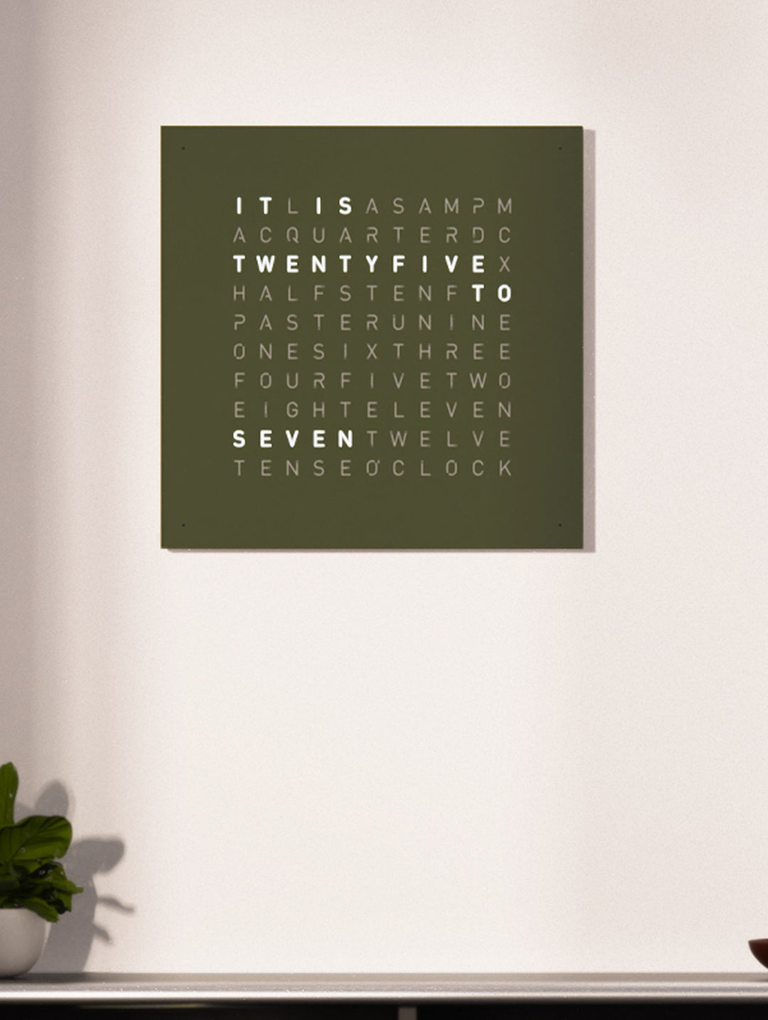 QLOCKTWO EARTH 45 Olive in a living room