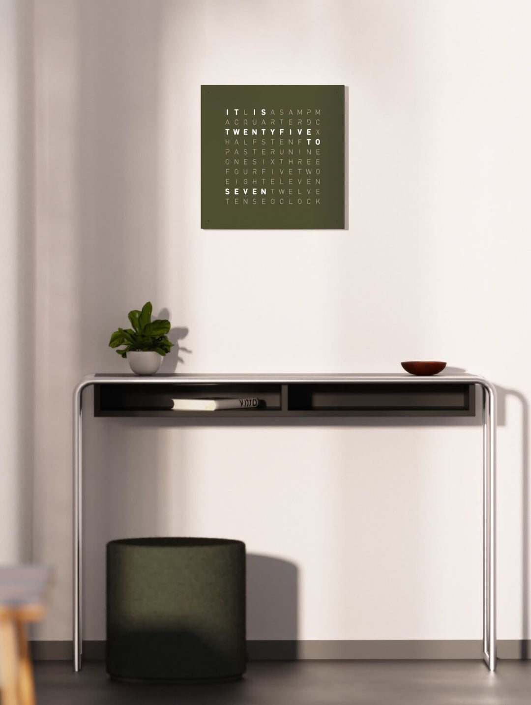 QLOCKTWO EARTH 45 Olive wall clock over a console