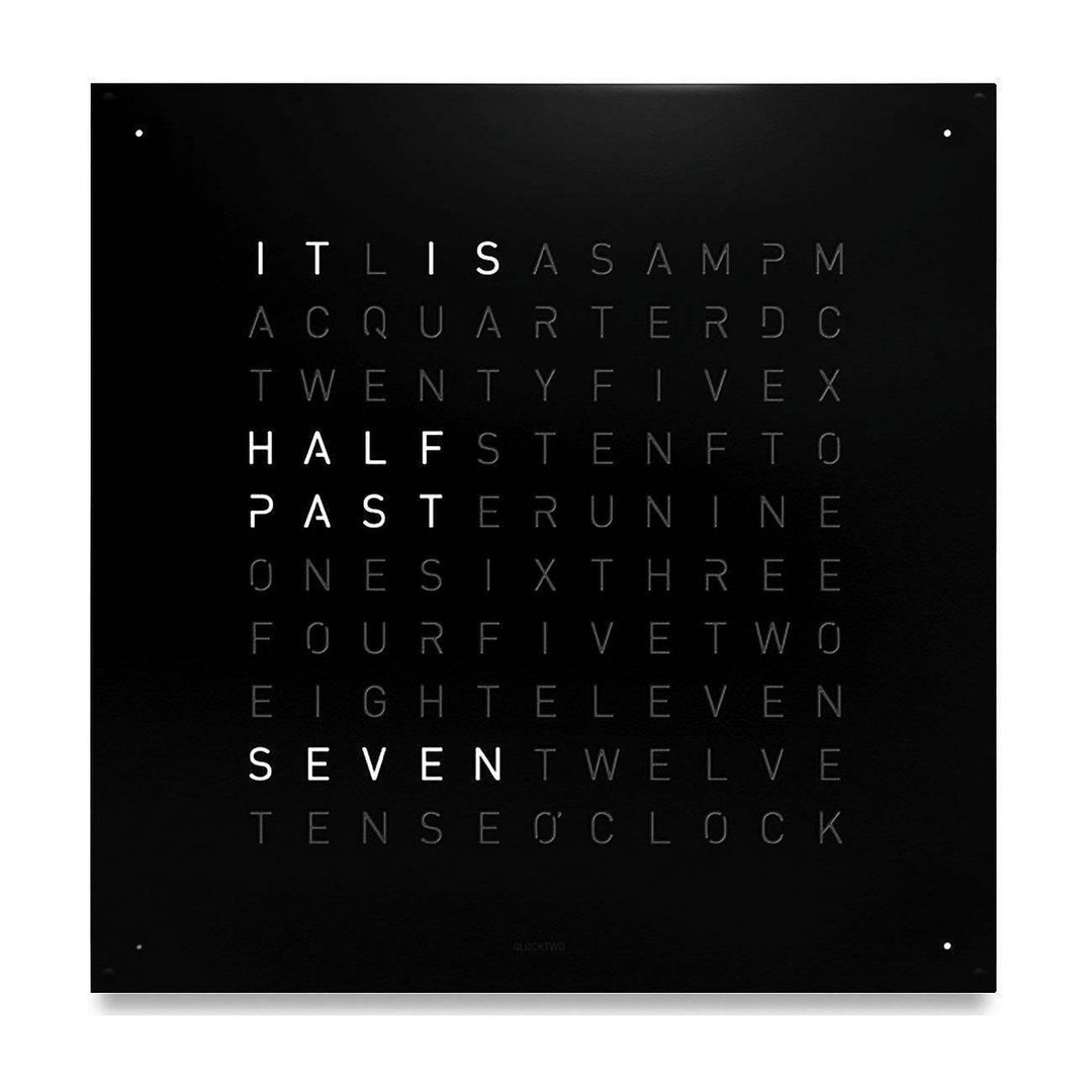 QLOCKTWO EARTH 90 wall clock in Black Pepper with illuminated words, front view