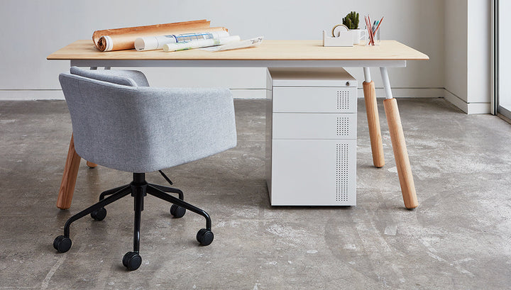 Radius Task Chair by Gus Modern in a styled workspace