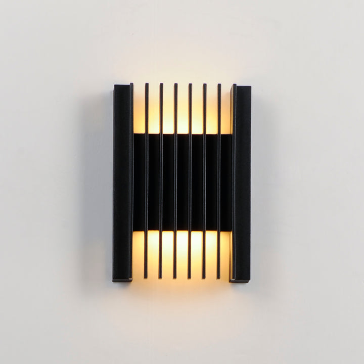 Rampart Small LED Outdoor Wall Sconce by ET2 Lighting, styled view 3
