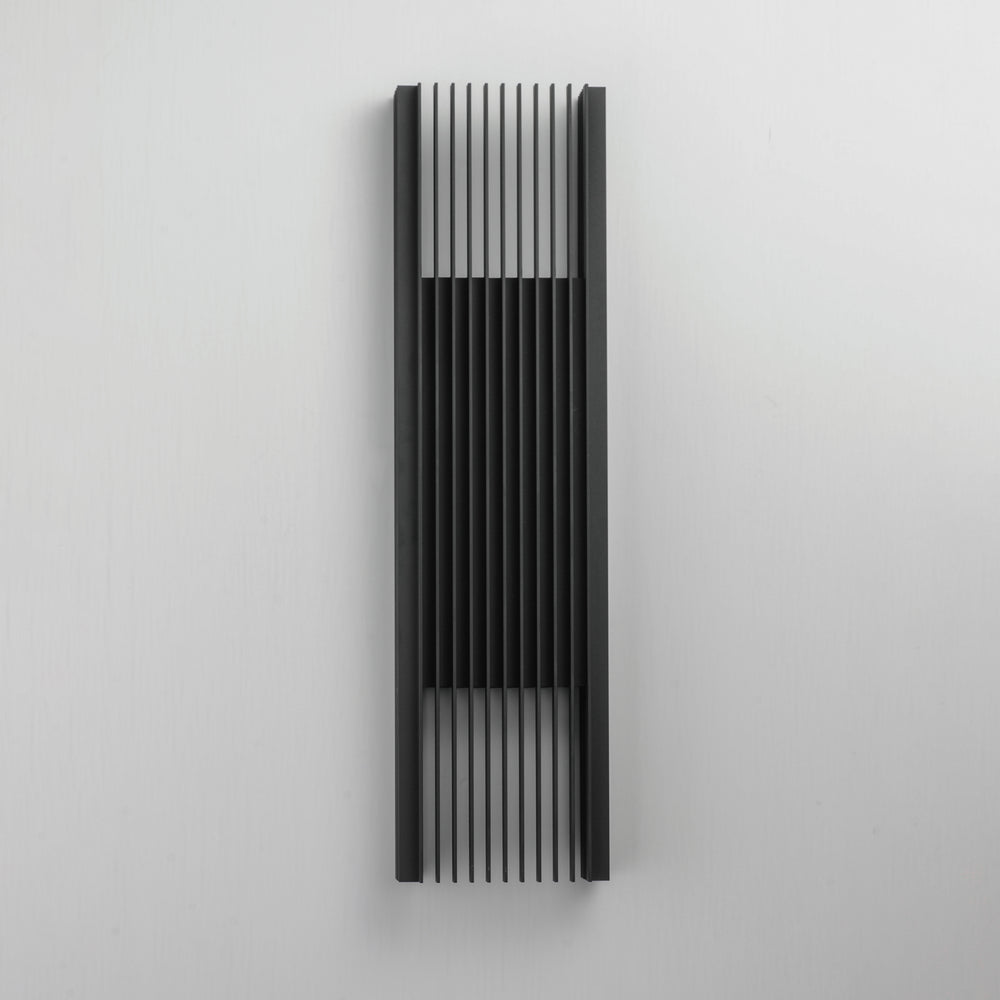 Rampart XL LED Outdoor Wall Sconce by ET2 Lighting, styled view 1