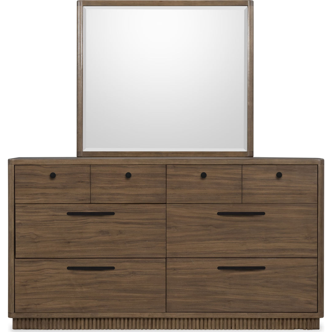 Ravelle Dresser in Walnut Grove — on a white background with the matching mirror (sold separately)