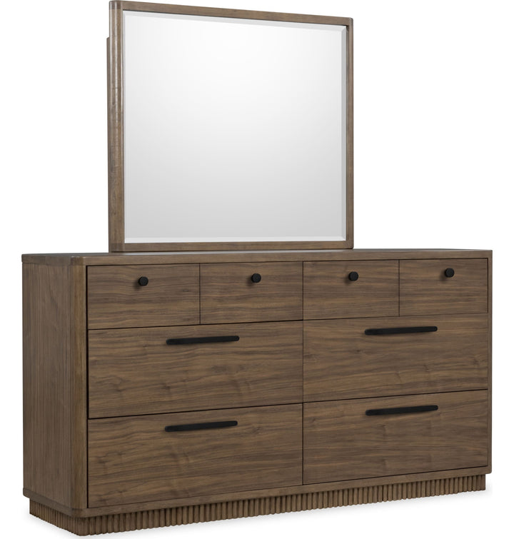 Ravelle Dresser in Walnut Grove — on a white background with the matching mirror (sold separately)