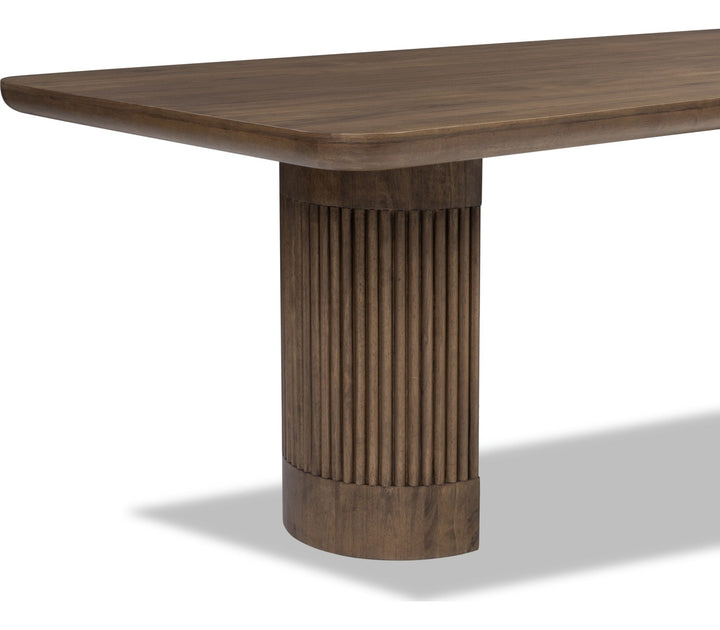 Ravelle Fixed Dining Table in Walnut Grove — product view on a white background