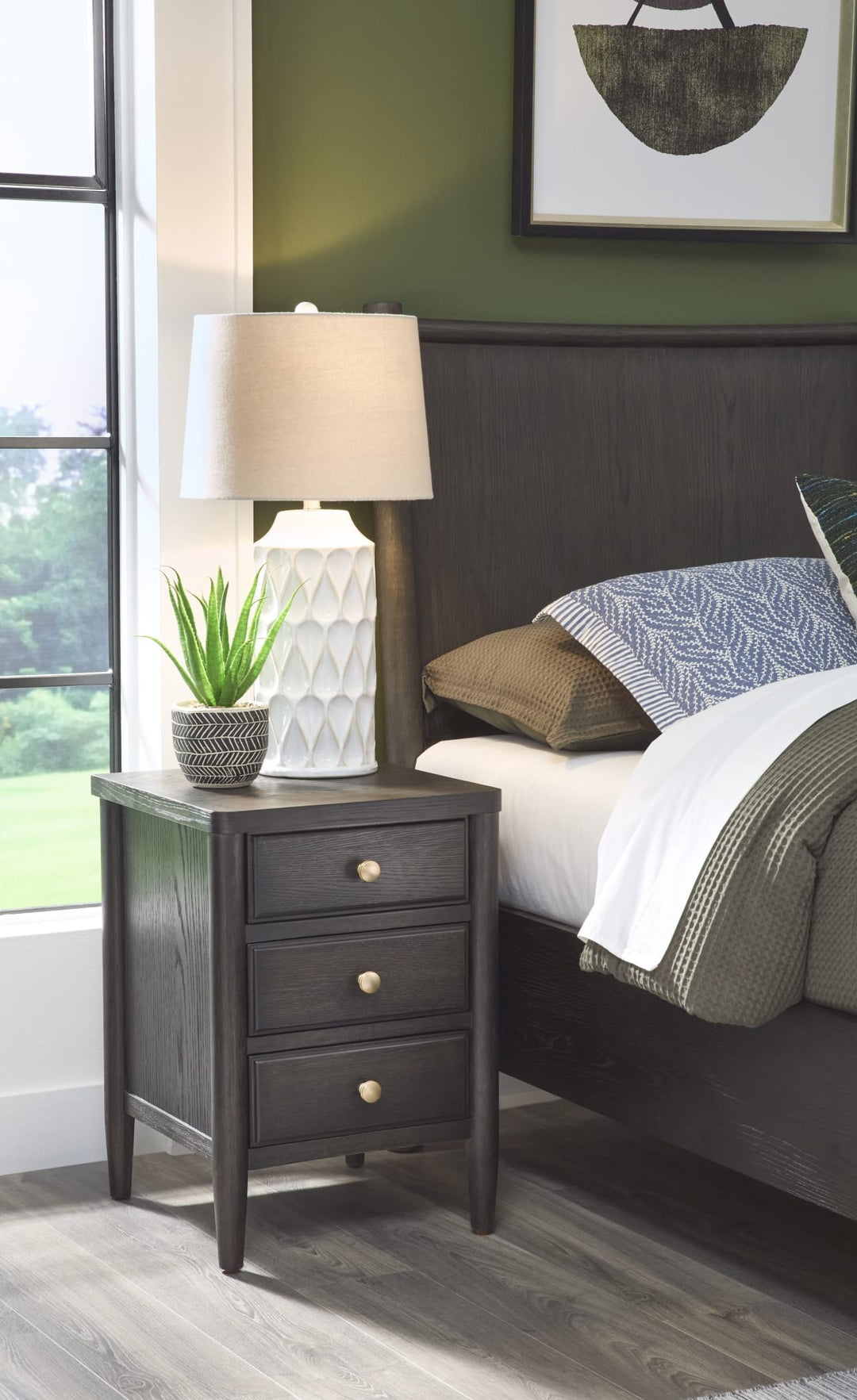 Rockport Three Drawer Small Nightstand in Yin — in a bedroom setting
