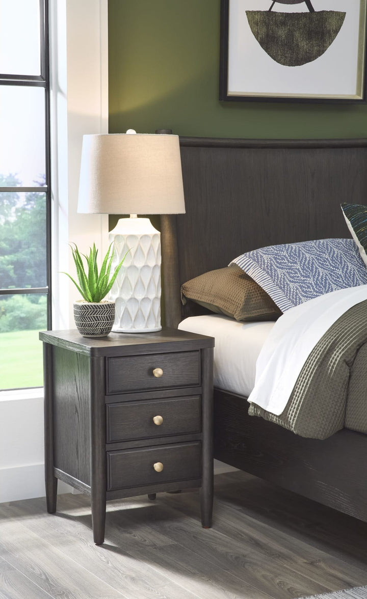 Rockport Three Drawer Small Nightstand in Yin — in a bedroom setting
