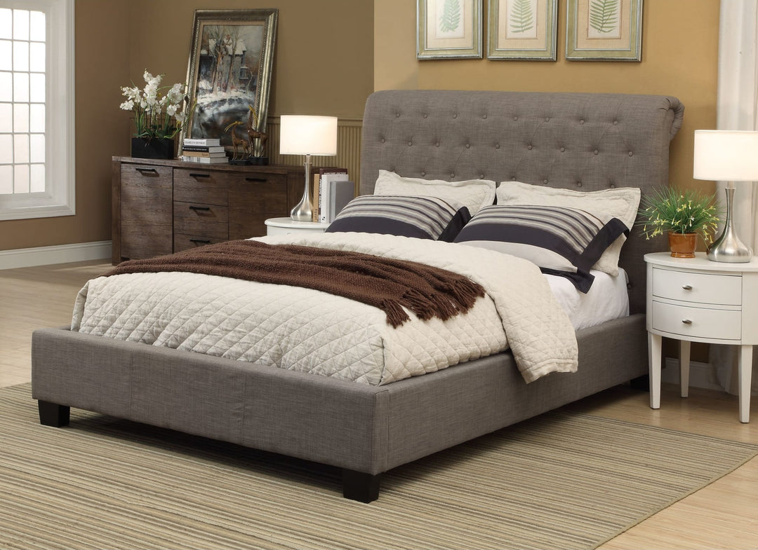 Royal Tufted Upholstered Footboard Storage Bed in Dolphin Linen styled in a bedroom