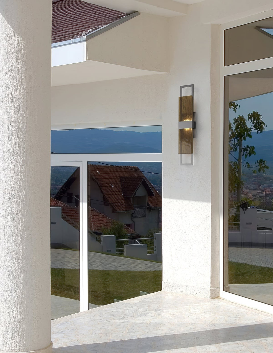 Sasha Outdoor Sconce by Hammerton Studio in a styled interior