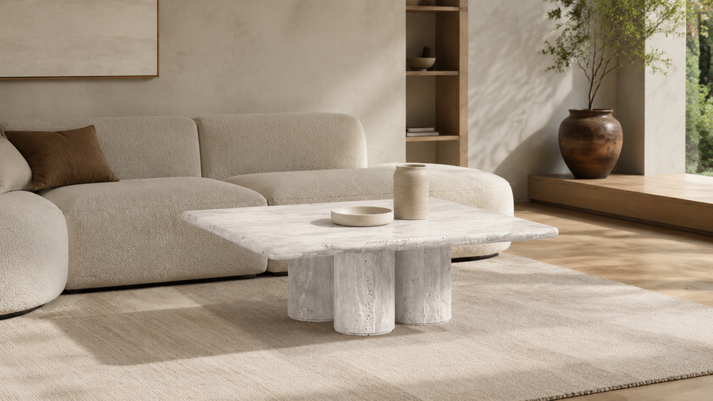 SHELTER white travertine coffee table in a modern home living room