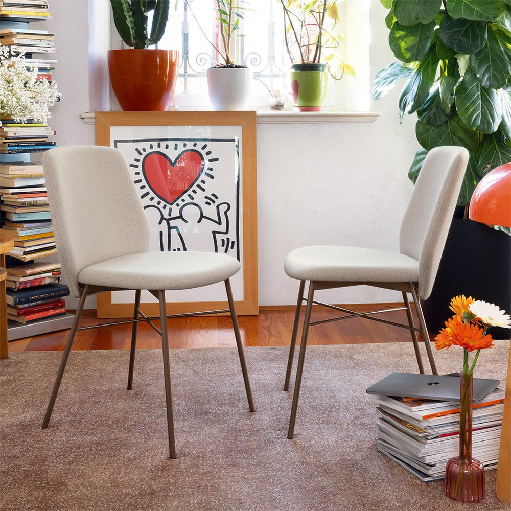 Sibilla Soft Dining Chair by Connubia in a styled interior