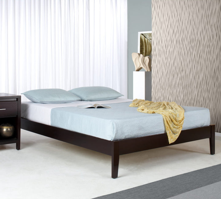 Simple Wood Platform Bed in Espresso styled in a bedroom