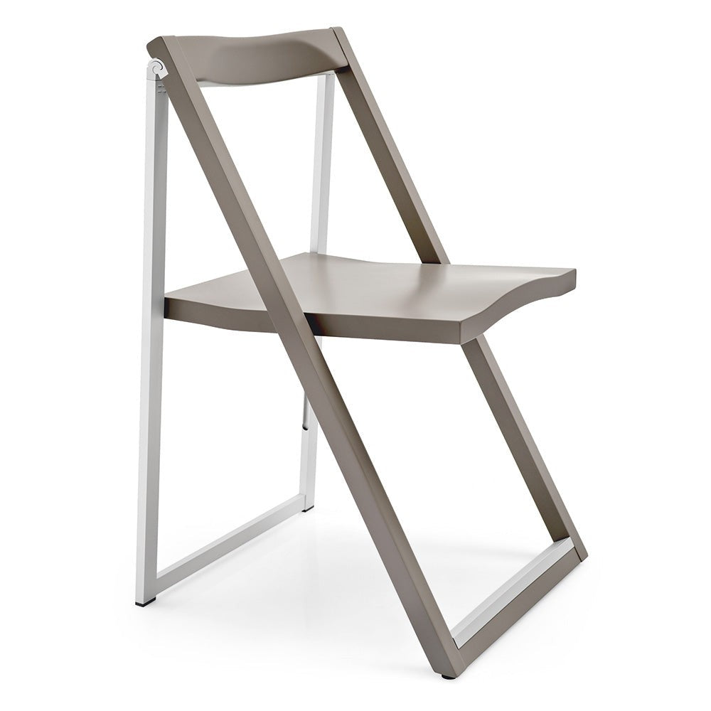 Skip Folding Chair by Connubia in a styled interior