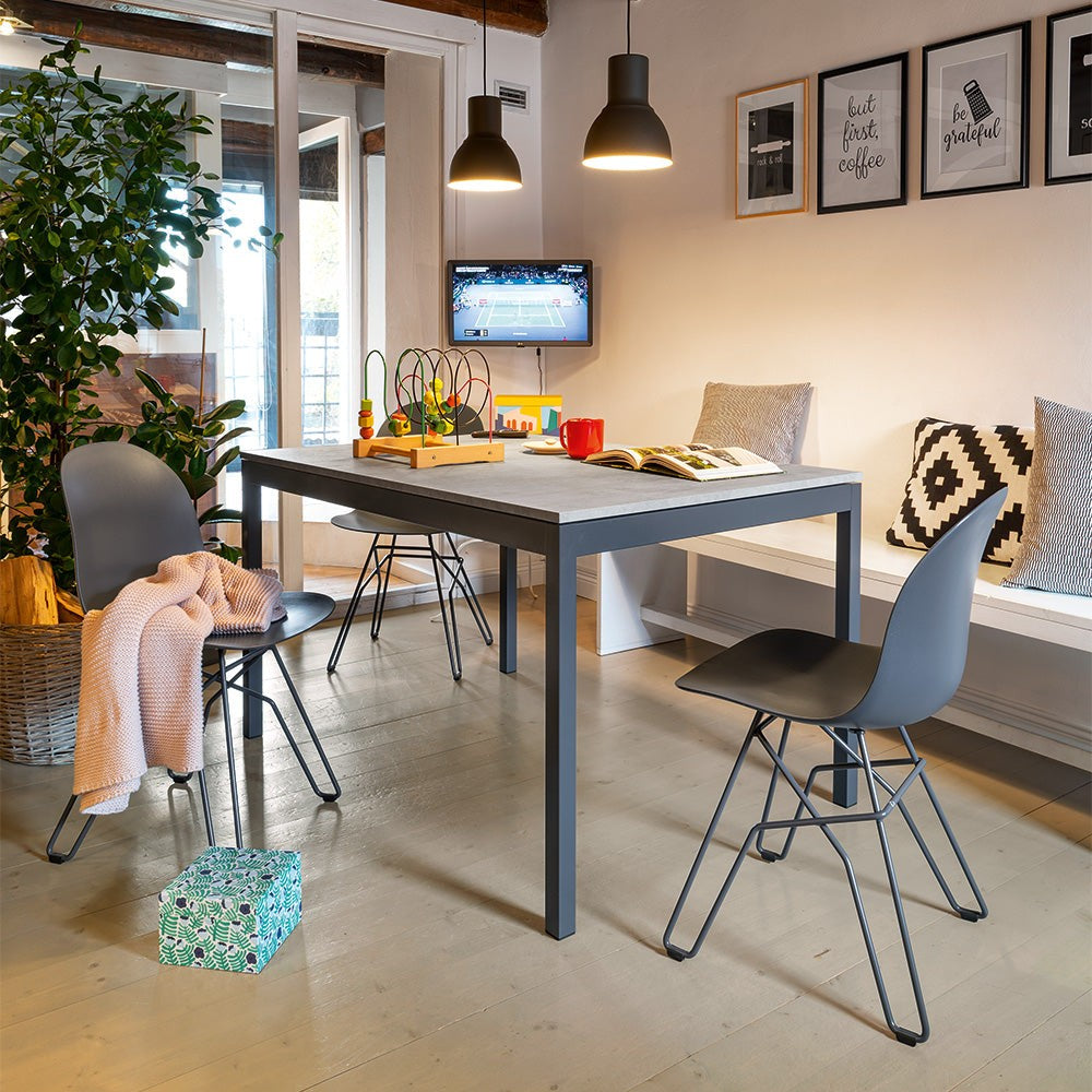 Snap Extendable Dining Table by Connubia in a styled interior