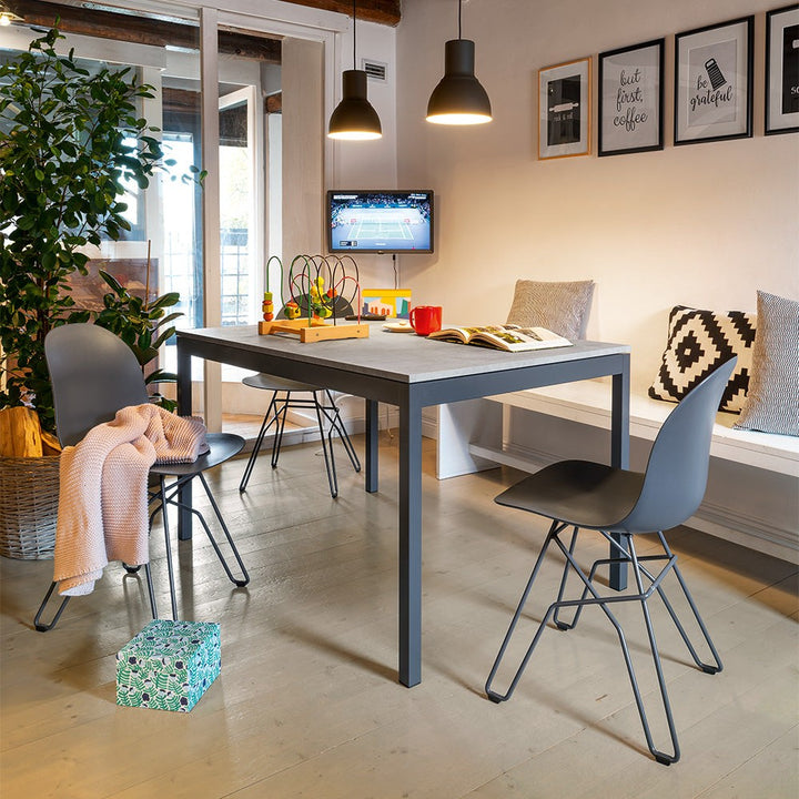 Snap Extendable Dining Table by Connubia in a styled interior