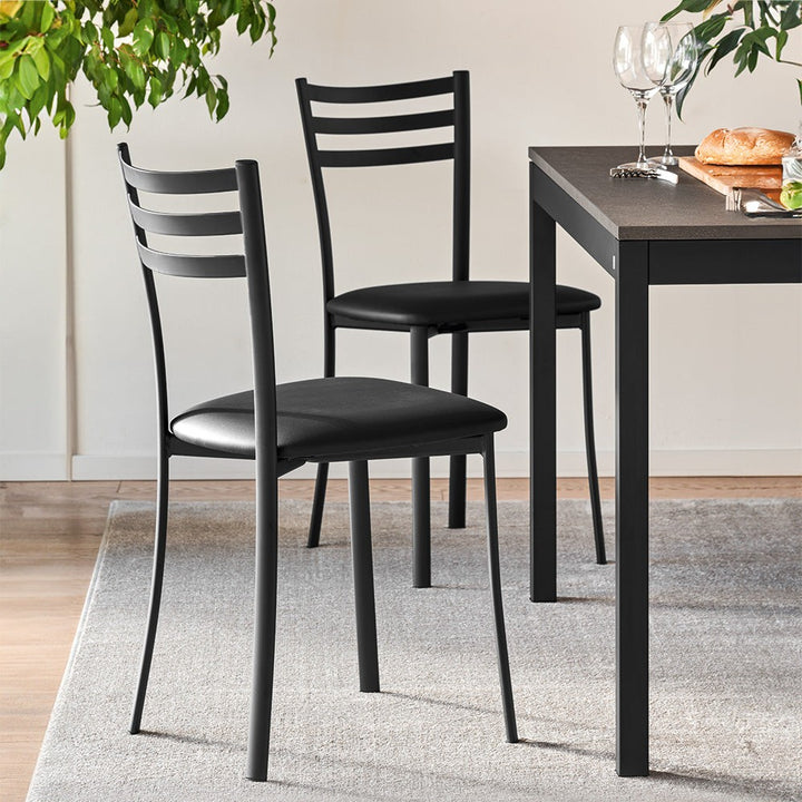 Snap Extendable Dining Table by Connubia in a styled interior