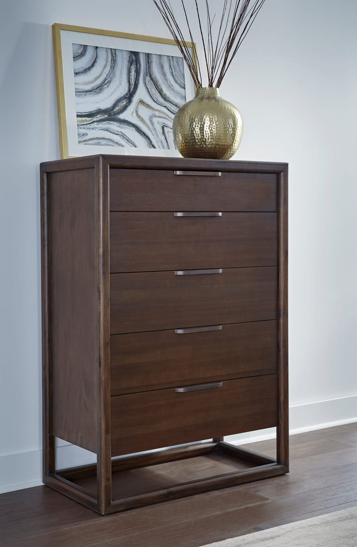 Sol Five Drawer Chest in Brown Spice — styled in a room