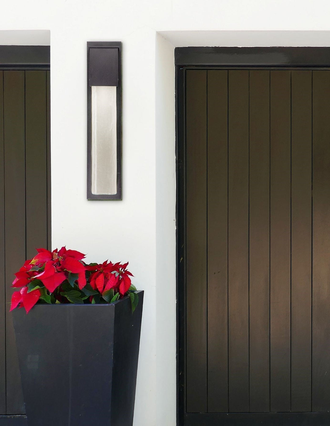 Square Outdoor Cover Sconce by Hammerton Studio in a styled interior