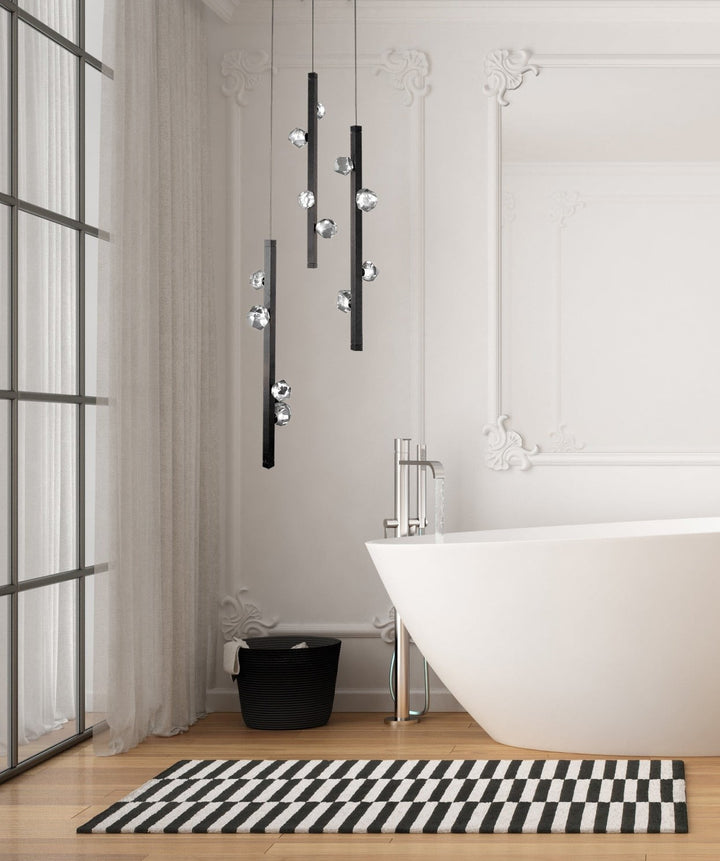 Stella Round Pendant Chandelier by Hammerton Studio in a styled interior
