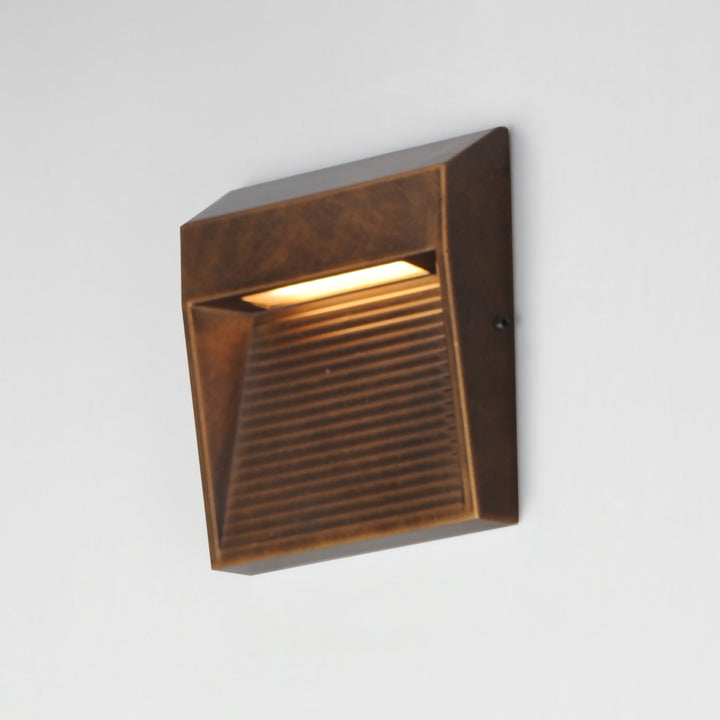 Steppes Small LED Outdoor Wall Sconce by ET2 Lighting, styled view 5