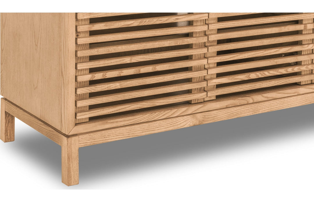 Tanner Four Door Solid Ash Media Console in Flaxen — product view on a white background