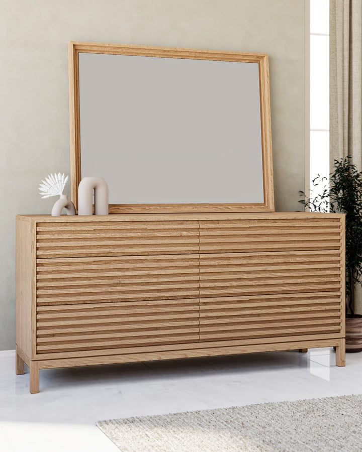 Tanner Six Drawer Dresser in Flaxen — styled with the matching mirror (sold separately)
