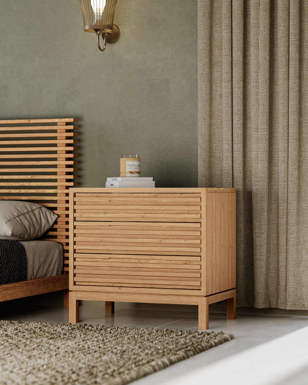 Tanner Three Drawer USB-Charging Nightstand in Flaxen — in a bedroom setting