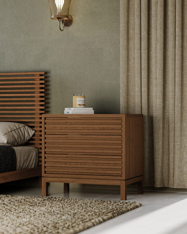 Tanner Three Drawer USB-Charging Nightstand in Roux — in a bedroom setting