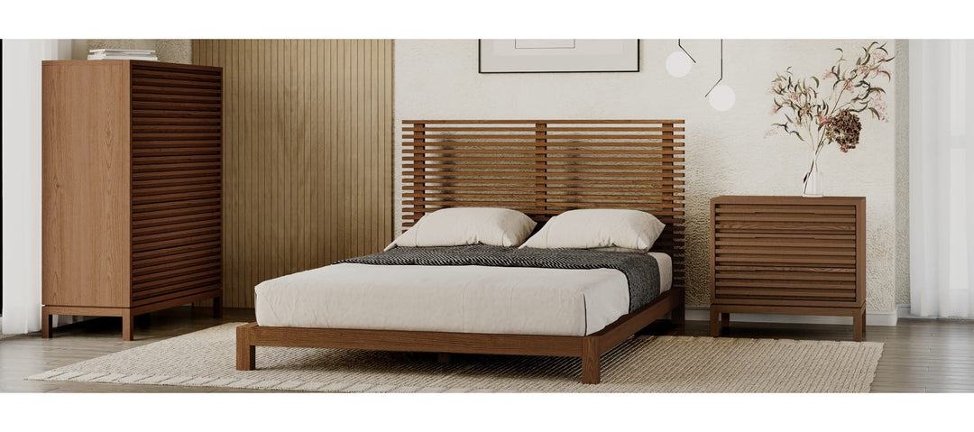 Tanner Three Drawer USB-Charging Nightstand in Roux — shown with the matching bedroom group (sold separately)