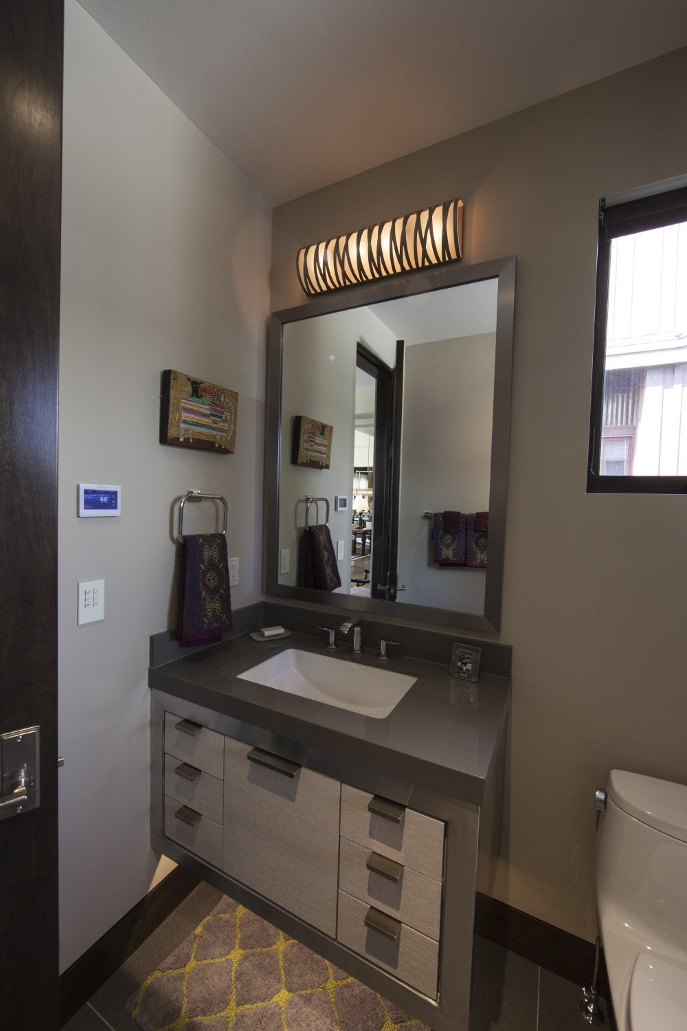 Tempest Cover Sconce by Hammerton Studio in a styled interior